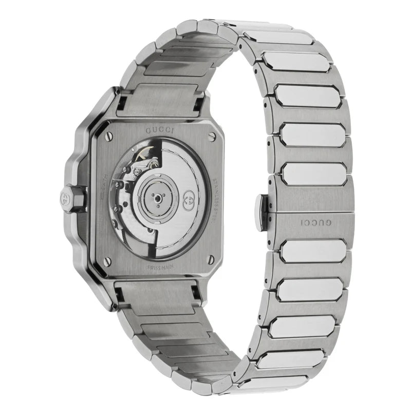 Gucci G-Flat caseback showing automatic movement visible through exhibition display