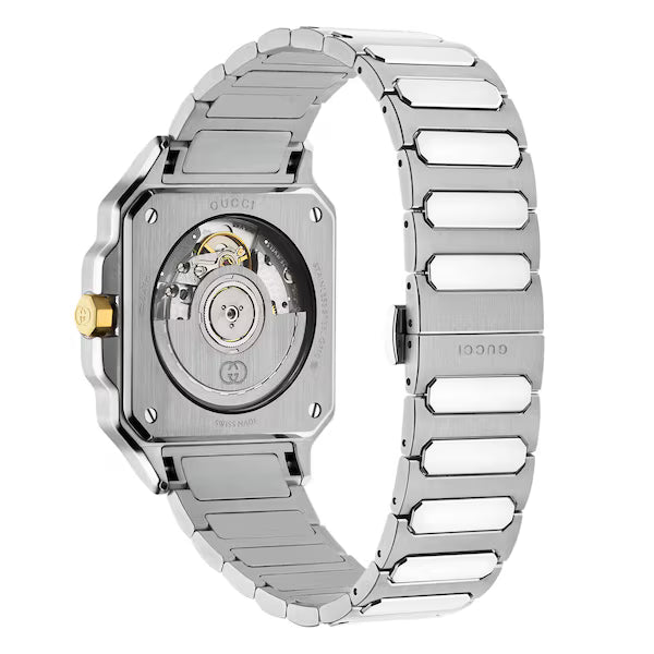 Gucci G-Flat watch caseback showing automatic movement visible through exhibition window