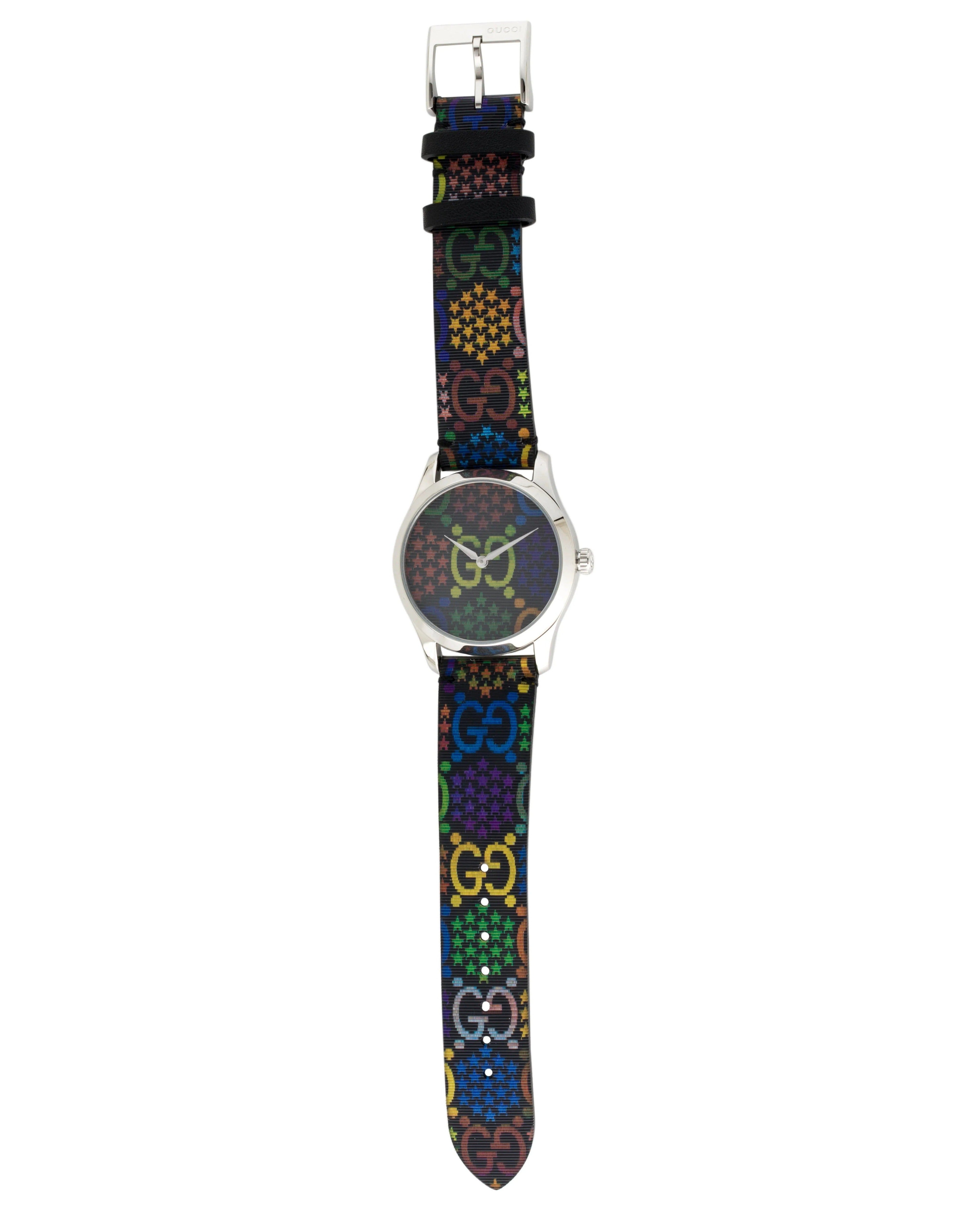Gucci GG Psychedelic G-Timeless watch worn on wrist with full strap length visible