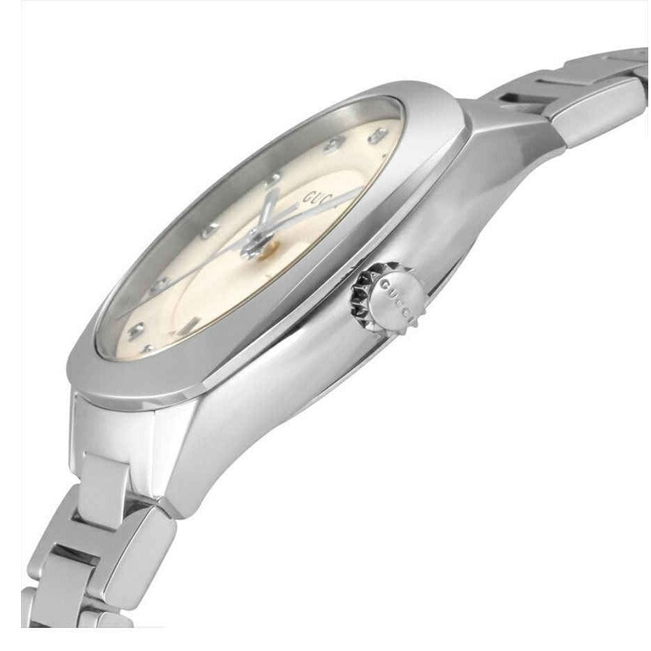 Gucci GG2570 side view showing white dial, case profile, and stainless steel bracelet