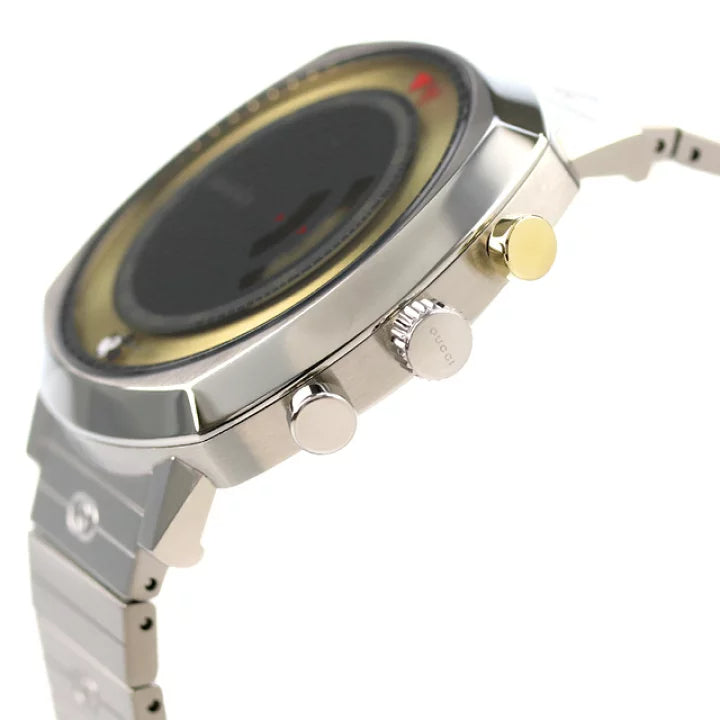 Close-up dial detail of Gucci Grip Disney Mickey Mouse watch with rotating gold and black disc