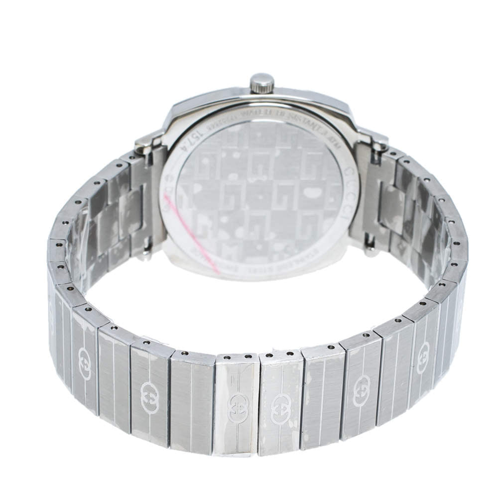 Gucci Grip Disney Mickey Mouse watch worn on wrist showing silver steel bracelet