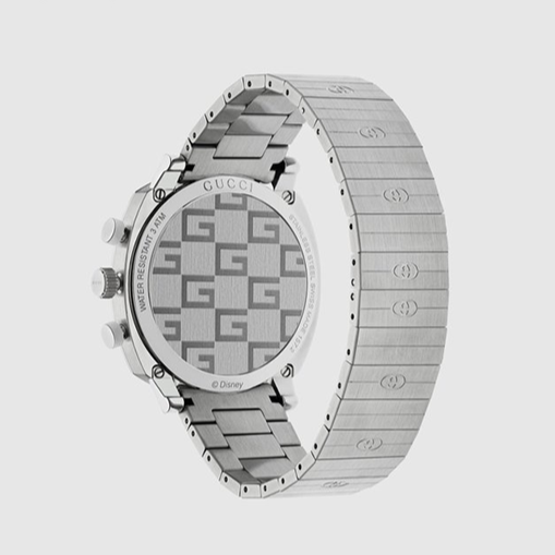 Gucci Grip Chronograph Mickey Mouse watch caseback with GG pattern and silver steel bracelet