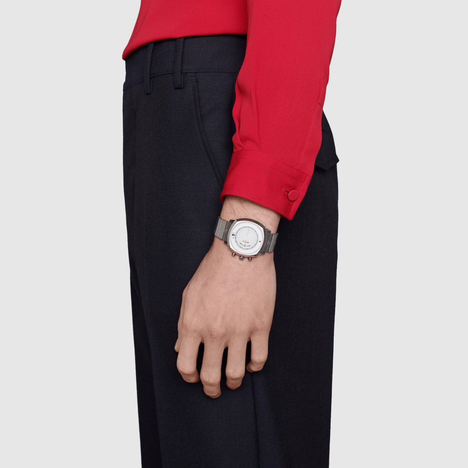 Gucci Grip Chronograph Mickey Mouse watch worn on wrist with white dial
