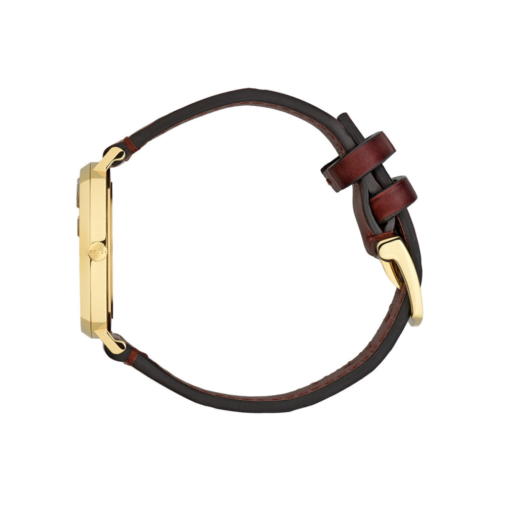 Gucci Grip watch worn on wrist with burgundy leather strap and gold-tone buckle