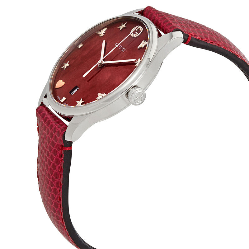 Side view of Gucci G-Timeless watch showing red leather strap and stainless steel case profile