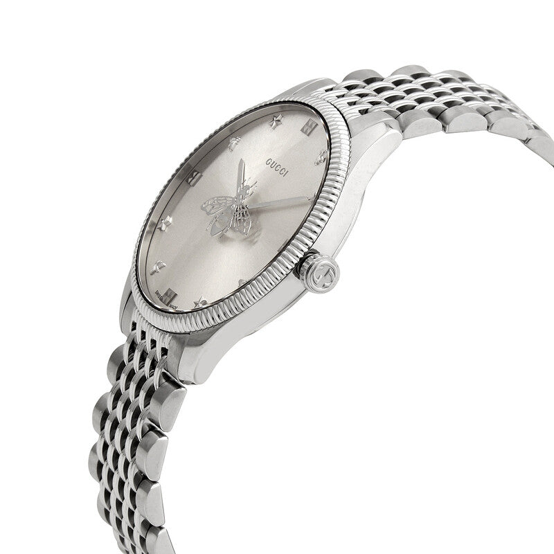 Side angle view of Gucci G-Timeless watch with stainless steel bracelet