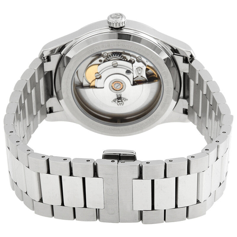 GUCCI G-Timeless caseback showing automatic movement with date window and Gucci logo