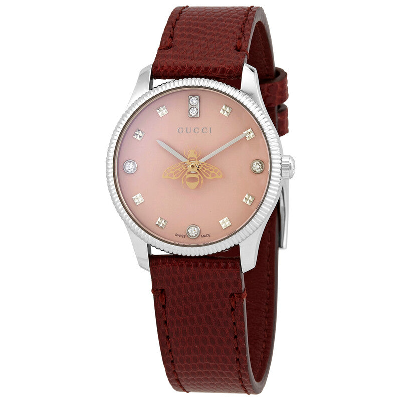 Gucci G-Timeless front view with pink dial, diamond indices, golden bee logo, and burgundy strap