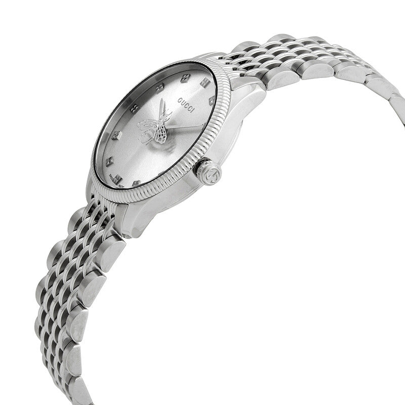 Gucci G-Timeless ladies watch angled view showing silver dial and stainless steel strap