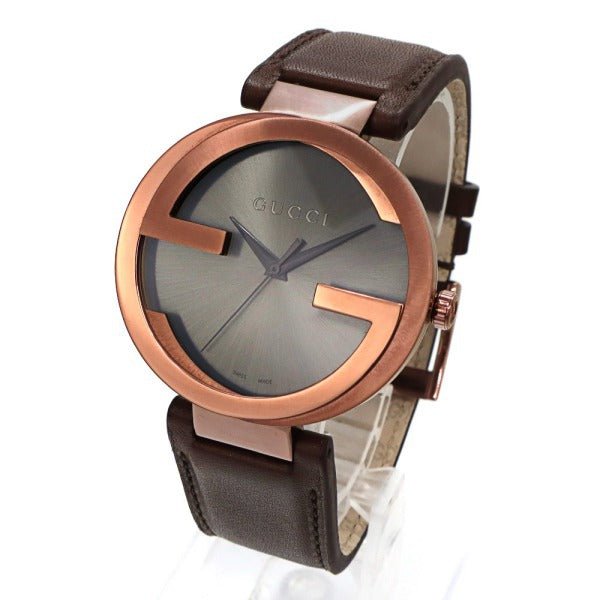 Gucci Interlocking G XL watch at angle showing brown leather strap