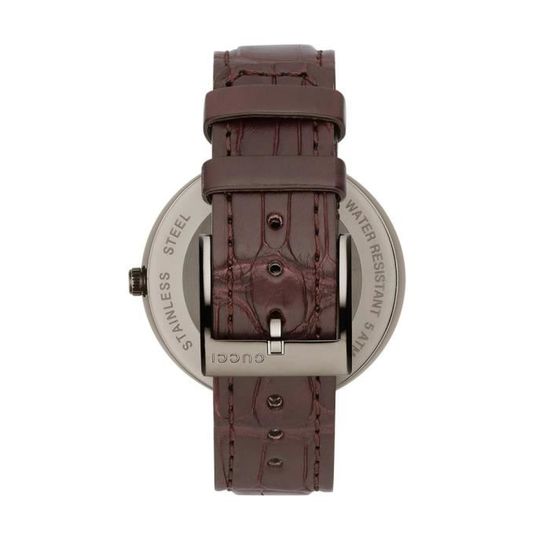 Gucci Interlocking G watch caseback showing Swiss movement and crocodile leather strap detail