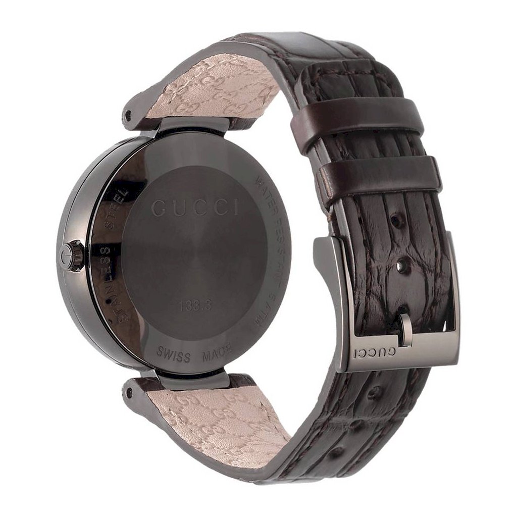 Side view of Gucci Interlocking G watch showing brown crocodile leather strap and case profile