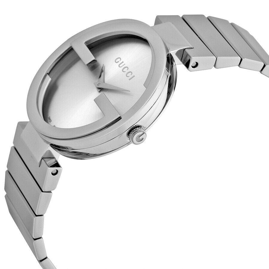 Angled view of Gucci Interlocking G watch displaying silver dial and stainless steel case