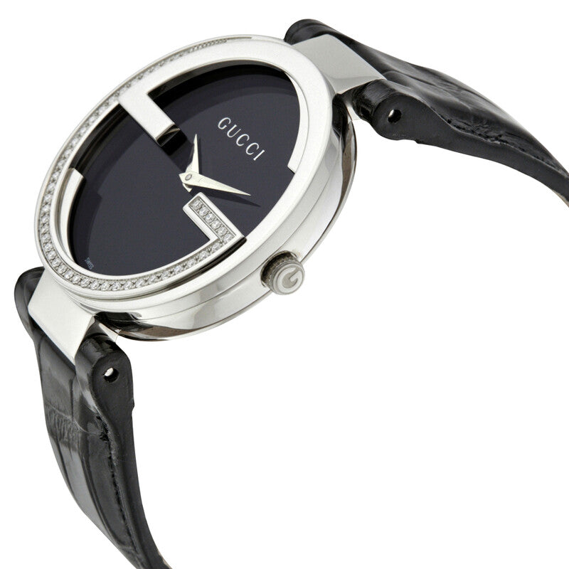 Side angle view of Gucci Interlocking watch showing interlocking design, diamond bezel and black leather strap