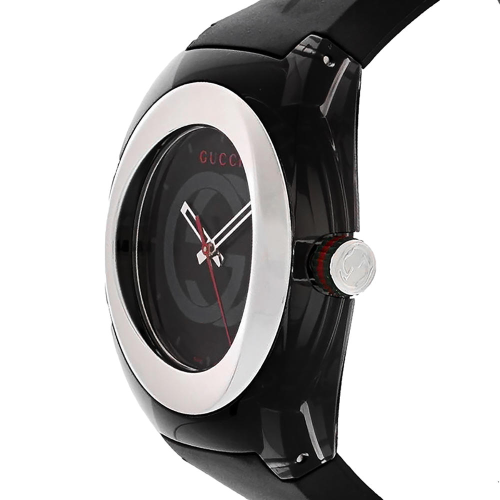 Gucci Sync watch at angle, displaying concentric dial design, stainless steel bezel, crown, and black rubber strap