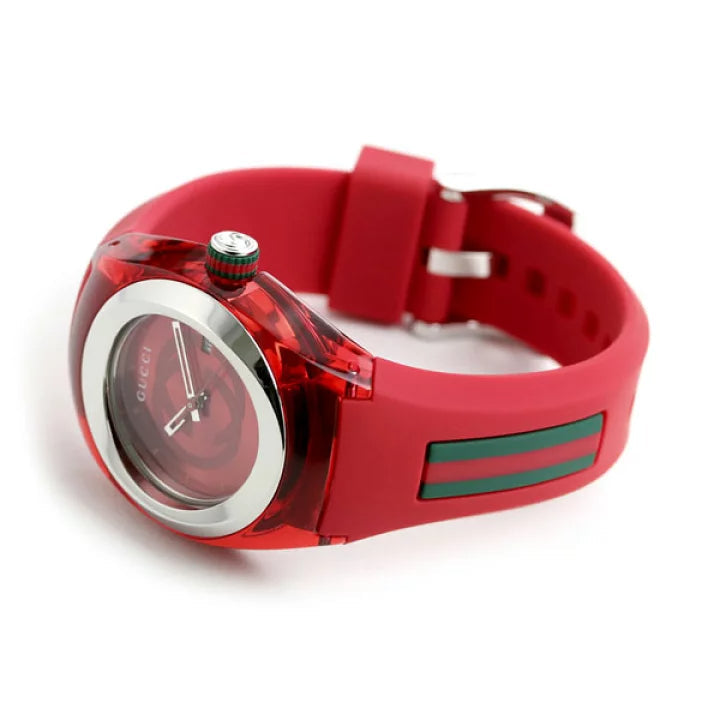 Gucci Sync ladies watch side view displaying red silicone strap and crown