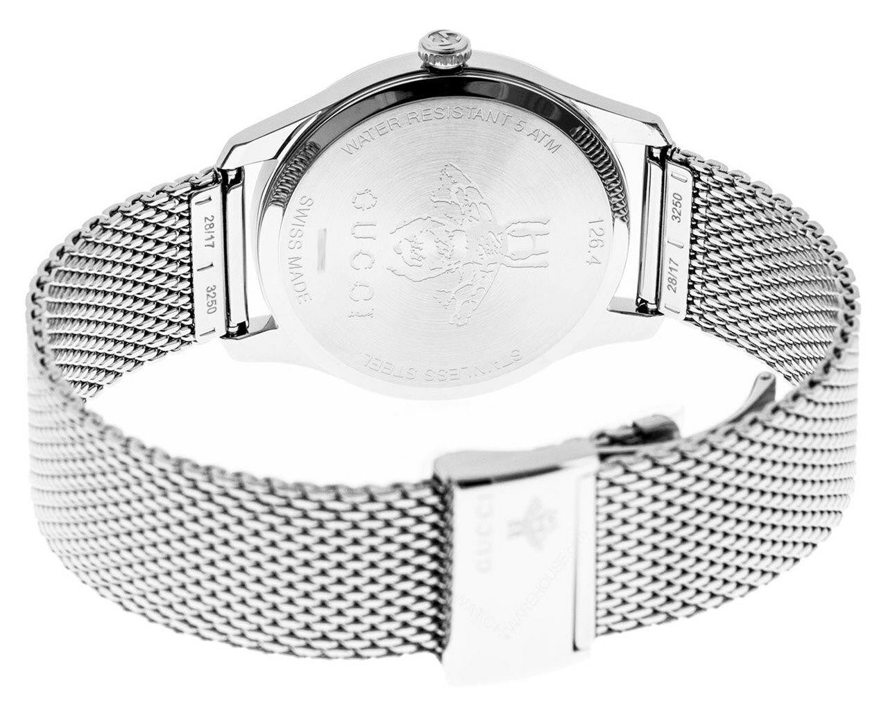 Gucci G-Timeless caseback showing stainless steel mesh bracelet and case details