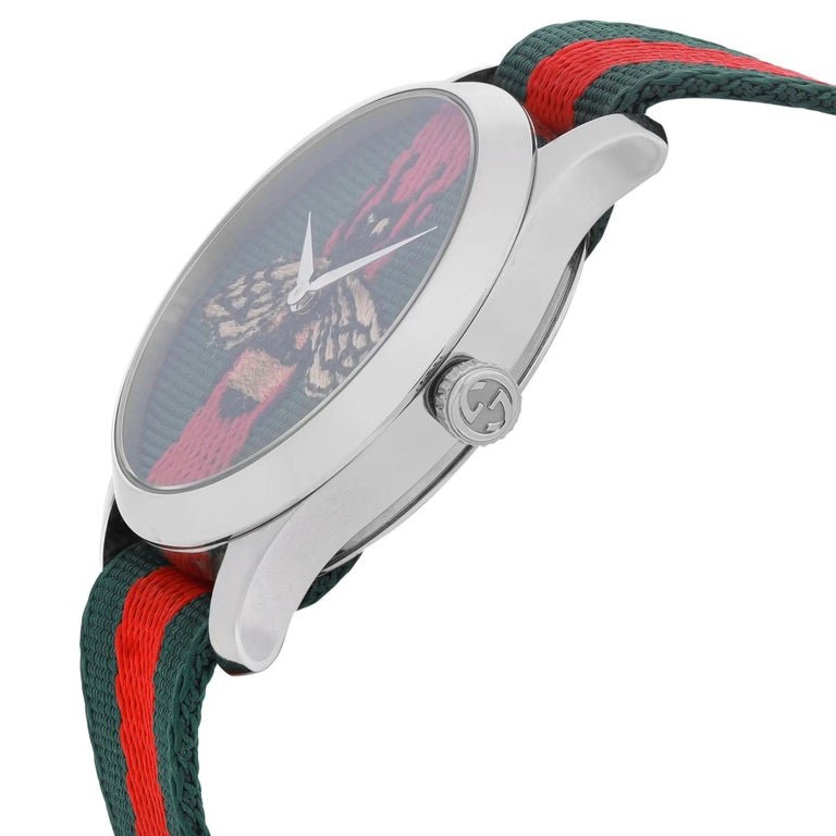 GUCCI Le Marche des Merveilles watch angled side view with stainless steel case and Web striped band