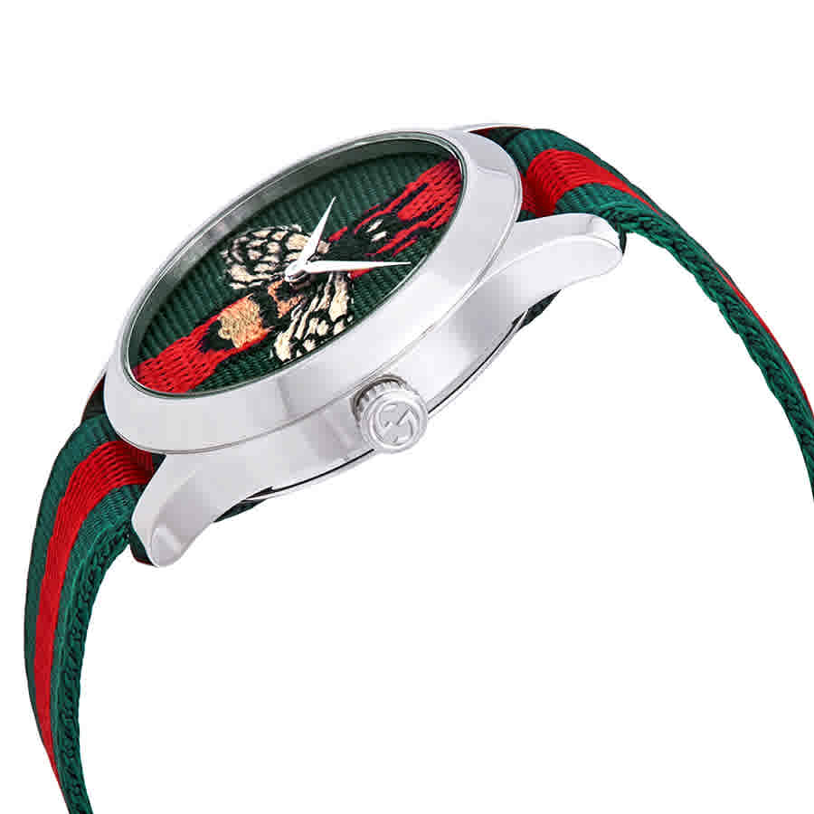 GUCCI Le Marche des Merveilles watch angled view showing stainless steel case and green-red strap