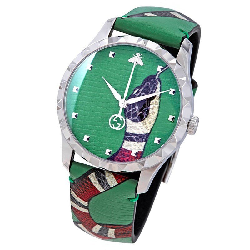Gucci Le Marche Des Merveilles angled view with green dial, white case, and kingsnake strap