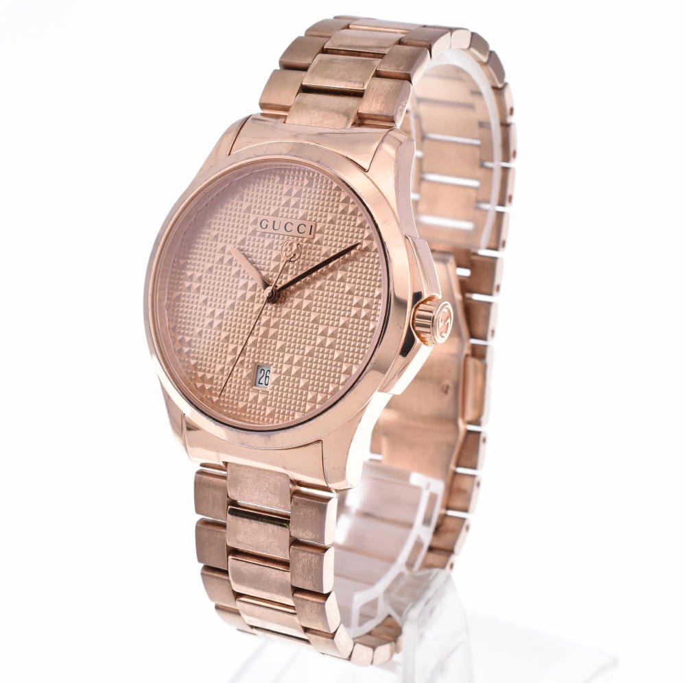 Gucci YA126482 G-Timeless rose gold watch angled side view showing case and bracelet