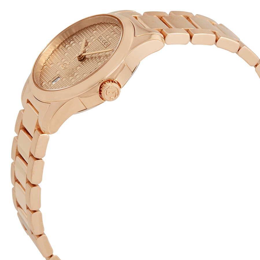 Gucci G-Timeless watch three-quarter view with rose gold case and metal strap