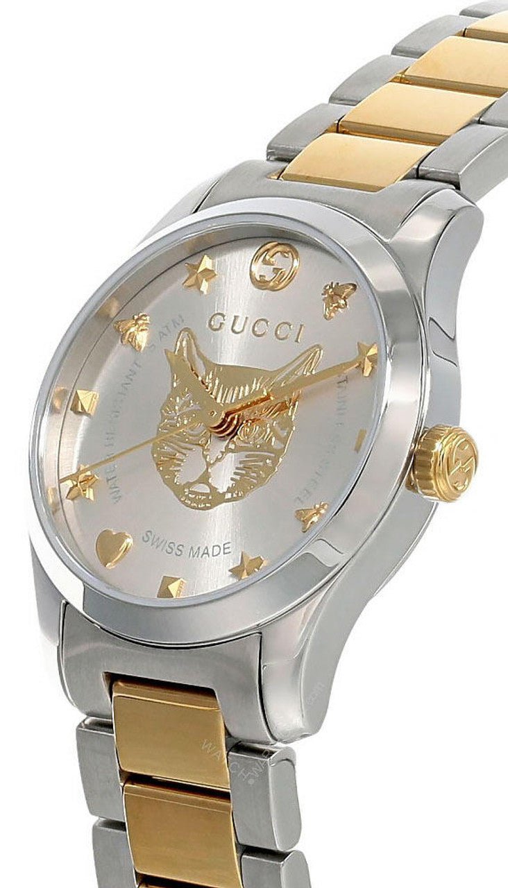 Side view of Gucci G-Timeless YA126599 watch showing crown and two-tone bracelet profile