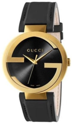 Gucci Interlocking G watch with black dial, gold case, and black leather strap