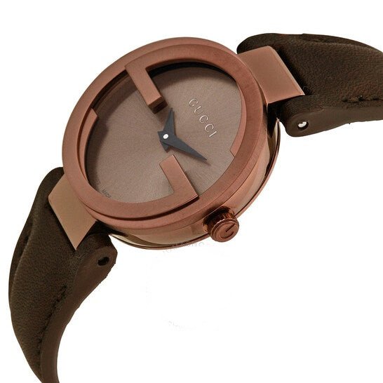 Gucci Interlocking G ladies watch displayed on wrist with brown leather strap