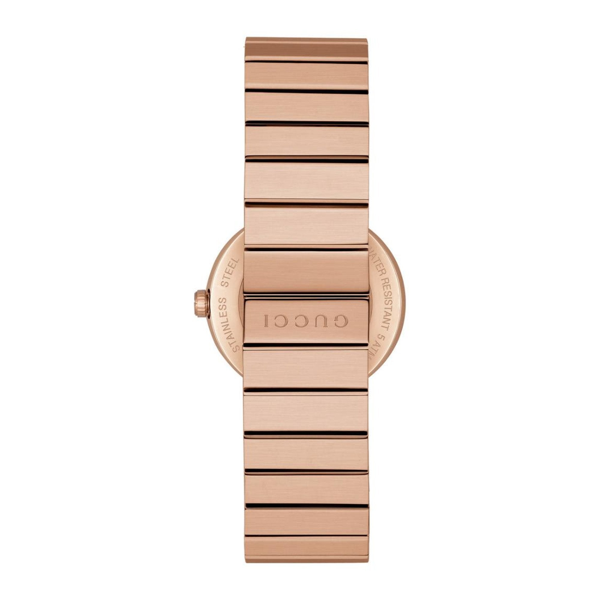Rose gold caseback of Gucci YA133515 watch engraved with model and serial details