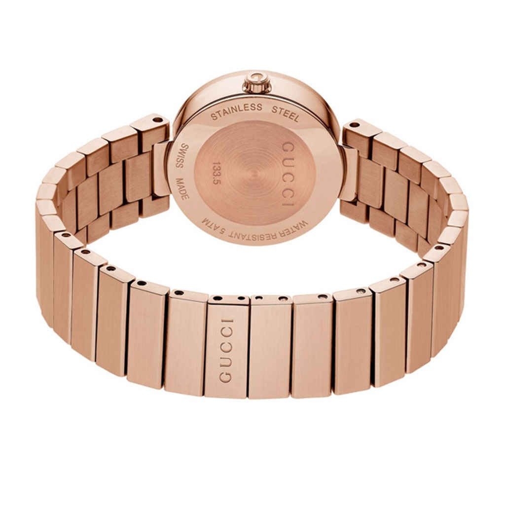 Gucci YA133515 rose gold women's watch with stainless steel bracelet worn on wrist
