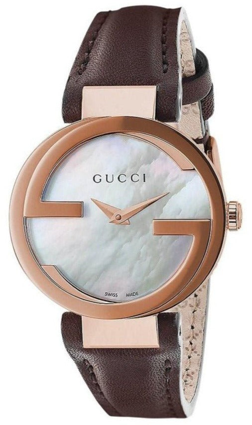 Gucci Interlocking ladies watch with rose gold case, mother-of-pearl dial, and brown leather strap
