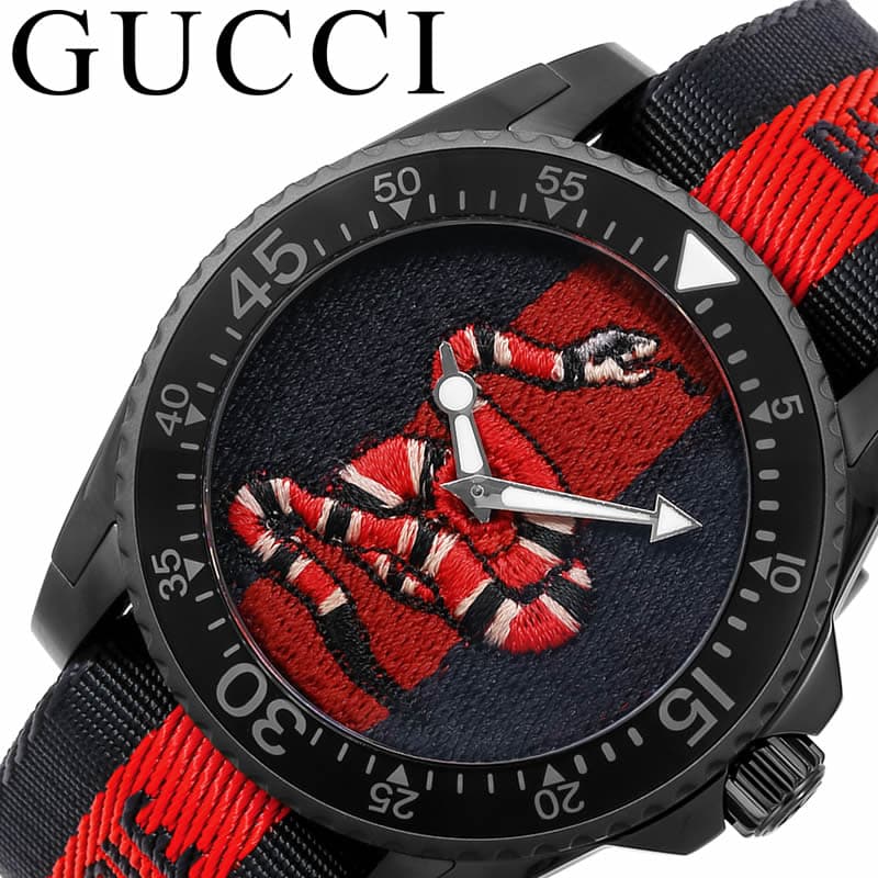 GUCCI Dive watch with embroidered snake dial, rotating bezel, and navy-red striped strap