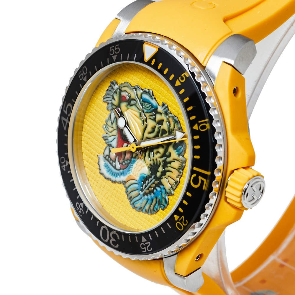 Side angle view of Gucci yellow tiger watch with stainless steel case and yellow silicone strap