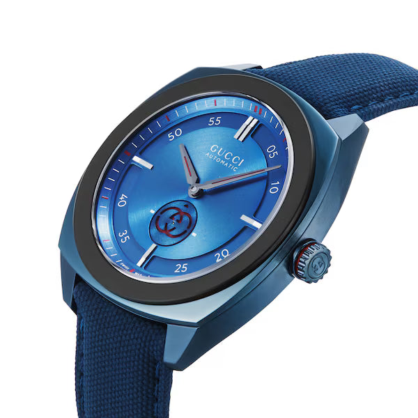 Gucci women's watch angled view showing blue dial and textile strap