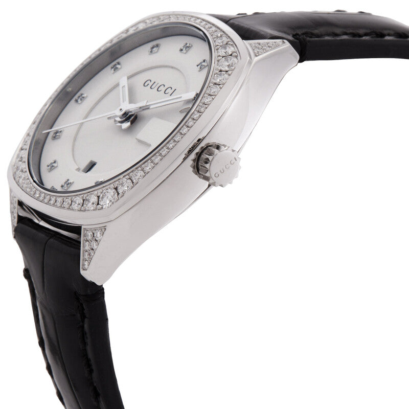 Side angle view of Gucci YA142507 watch showing case, bezel, and black leather strap