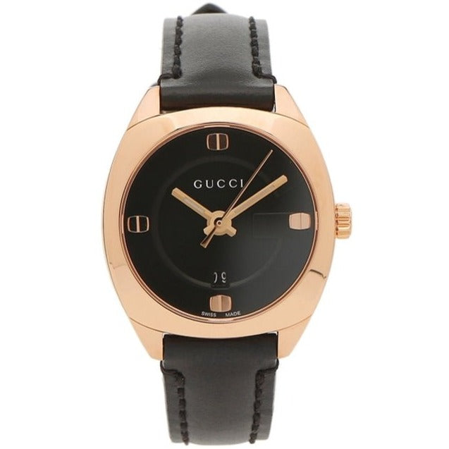 Gucci gold-tone watch with black dial and black leather strap, front view