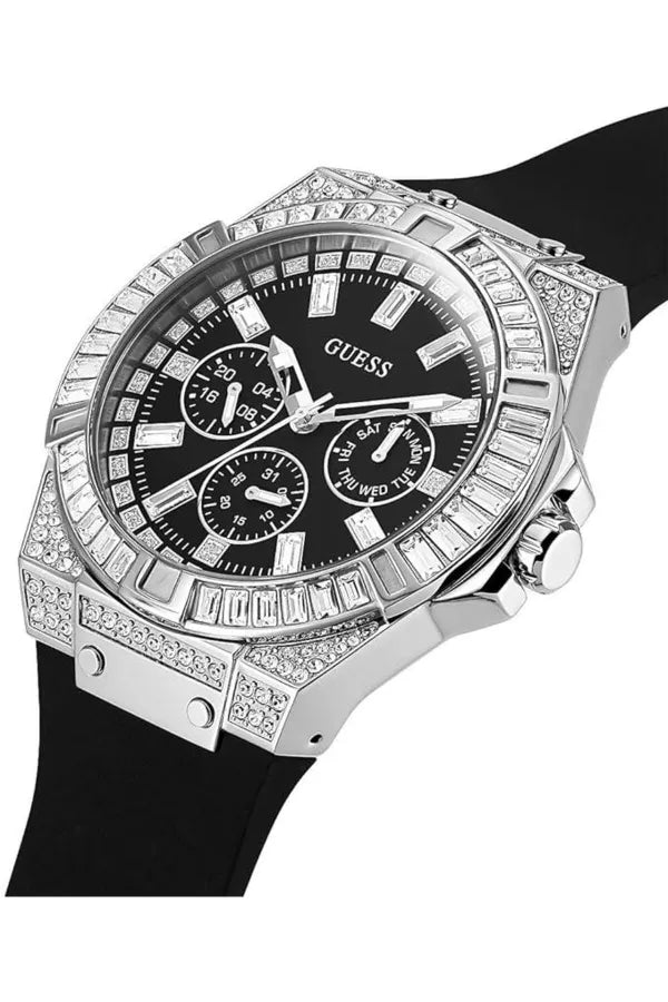 Angled view of Guess Baguette Crystals watch showing crystal-studded case and black rubber strap