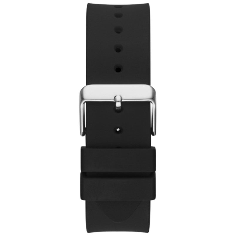 Close-up of black rubber strap with silver buckle on Guess Baguette Crystals watch