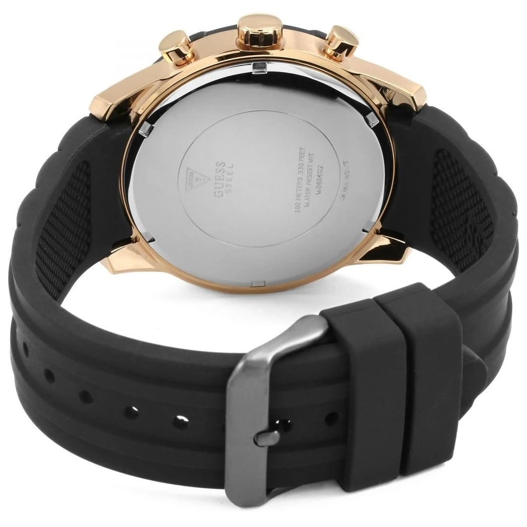 Guess Caliber watch caseback with stainless steel back and black silicone strap