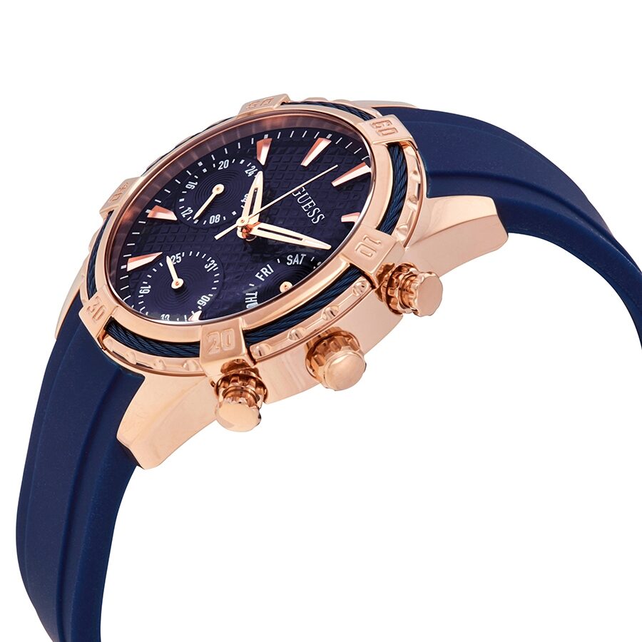 Side angle view of Guess Catalina chronograph watch showcasing rose gold case and blue silicone strap
