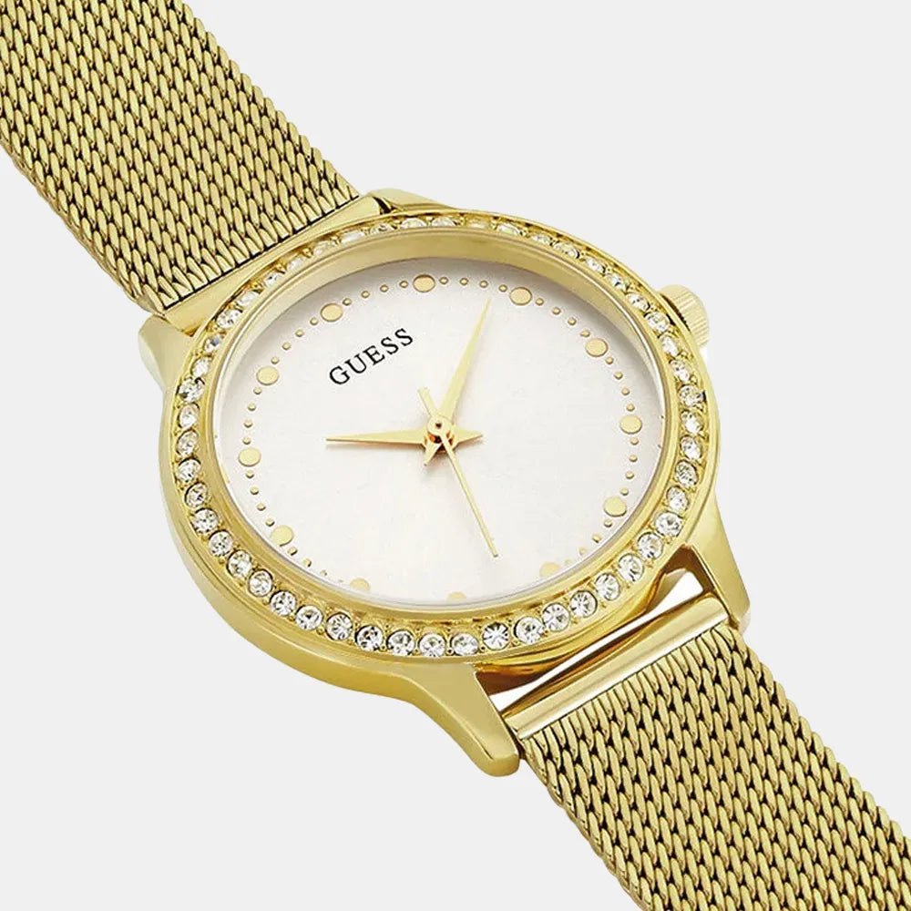 Guess Chelsea watch at angle showing gold mesh bracelet and crystal-set case
