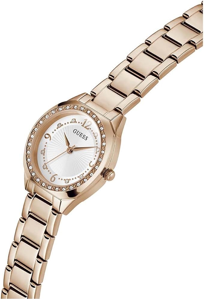 Angled view of Guess Chic Radiance gold watch with crystal-set bezel and link bracelet