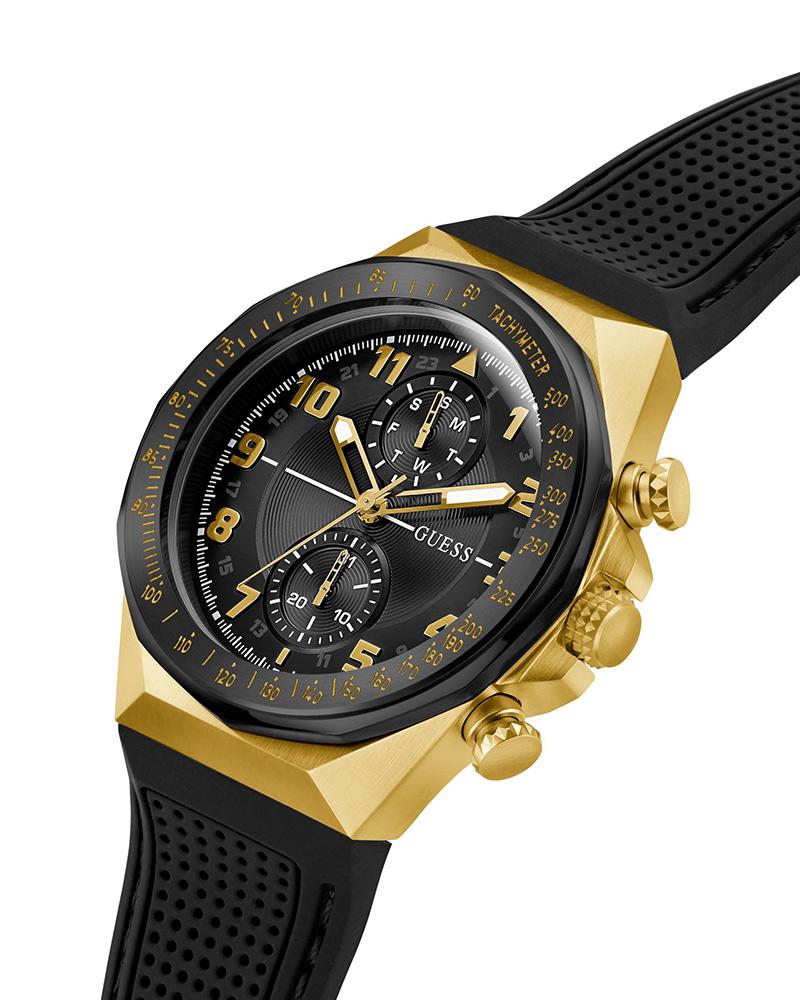 Side profile of ultra thin watch case with gold pushers and rubber strap