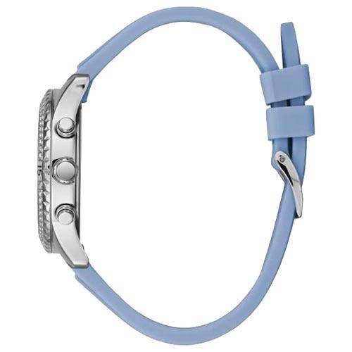Side view of Guess Confetti Crystal watch with blue rubber strap and silver pushers