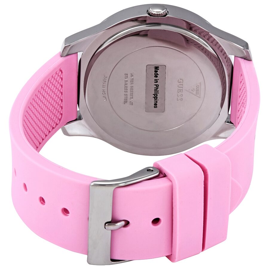 Guess Crush ladies watch caseback showing silver case back and pink silicone strap with buckle