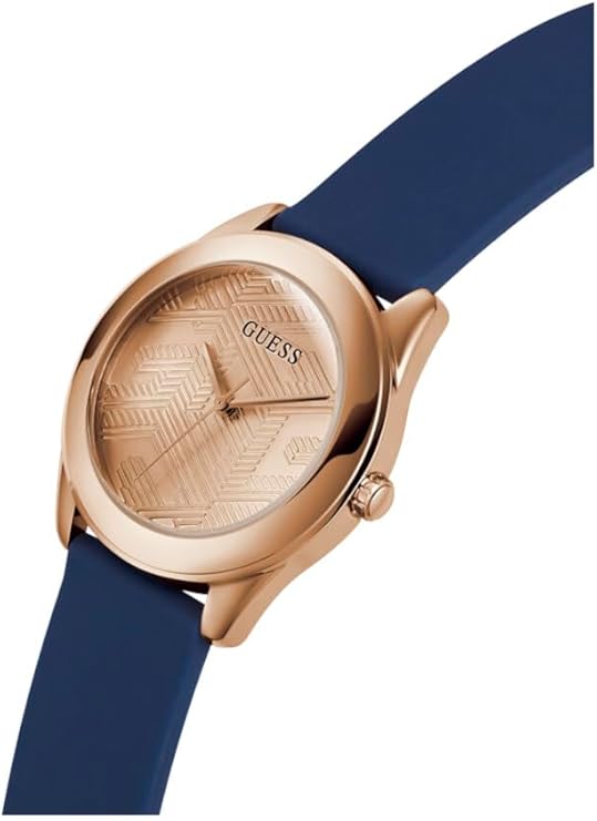 Guess Cubed watch worn on wrist with navy strap and rose gold case