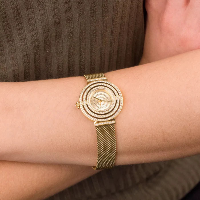 Guess Dream GW0550L2 women's watch on wrist showing gold mesh band detail