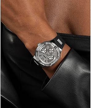 Guess Duchess women's watch on wrist with black silicone strap